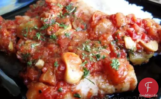 Fisch in Auberginen-Bolognese-Sauce
