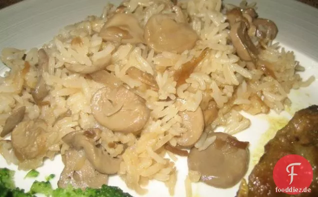 Schweinekotelett, Zwiebel und Reisauflauf