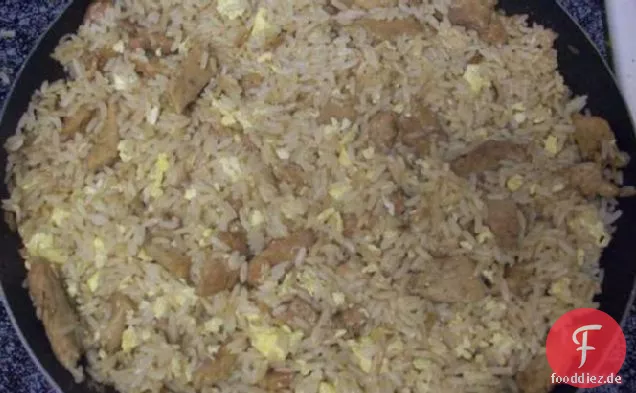 Schweinefleisch gebratener Reis