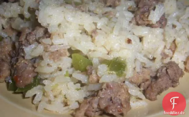 Wurst und Reis backen