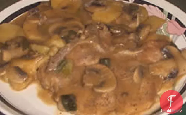 Gekochte Schweinekoteletts und Kartoffeln