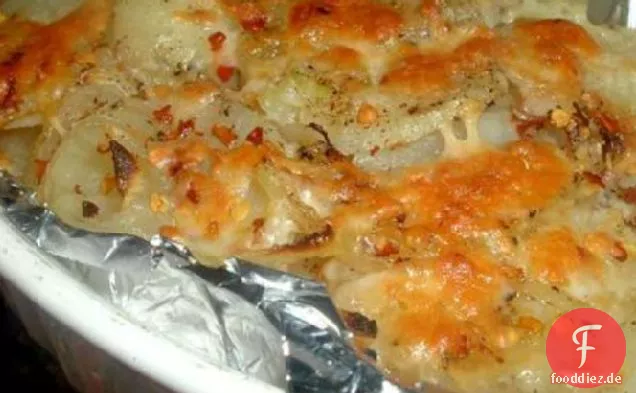 Gebackene Kartoffeln und Zwiebelkuchen