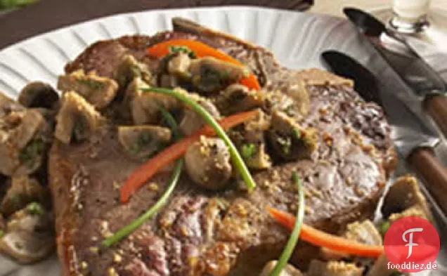 T-Bone Steak mit Parmesan-bestäubten Pilzen