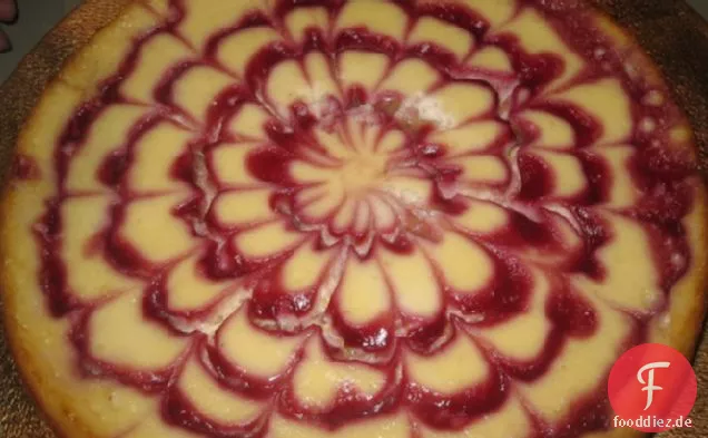 Vanille-Käsekuchen mit Schokoladen-Haselnuss-Kruste und Himbeeren