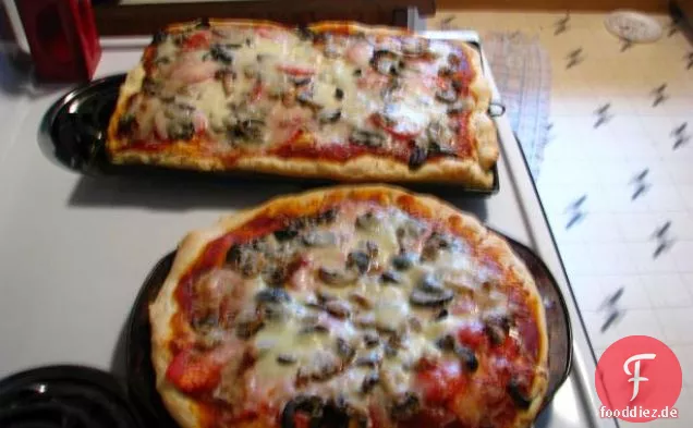 Schick und fröhlich - Herzhafter französischer Oliven-, Käse- und Zwiebelkuchen