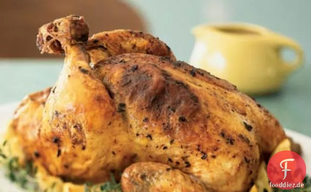 Gebratenes Huhn mit Zitronen und Thymian