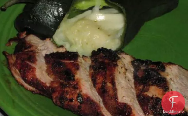 Gegrilltes Schweinefleisch und Poblano-Paprika