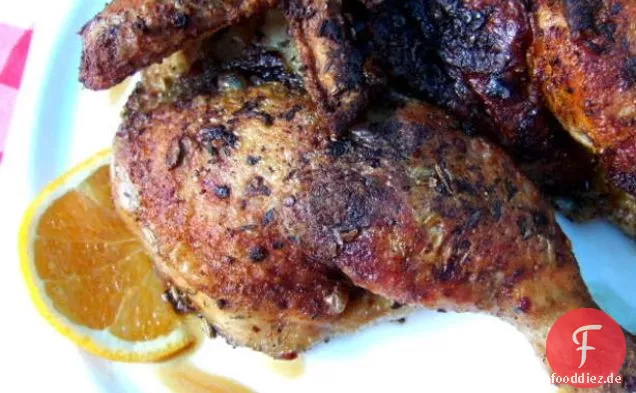Spatchcocked Crispy Happy Chicken mit reichhaltiger Orangensauce