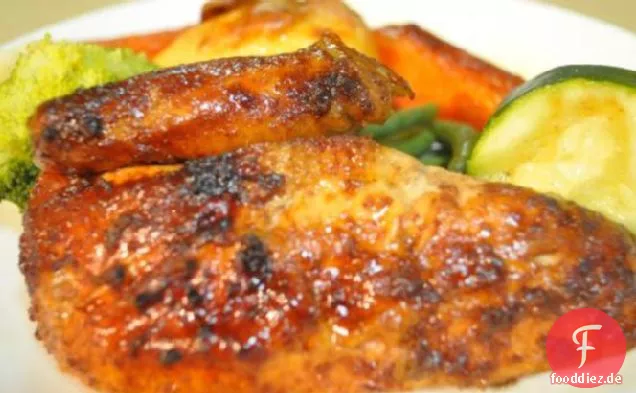 Ganzes klebrig glasiertes Huhn
