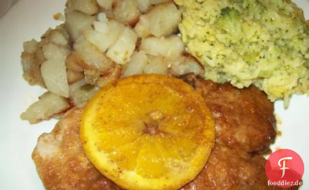 Orange Gebackene Schweinekoteletts