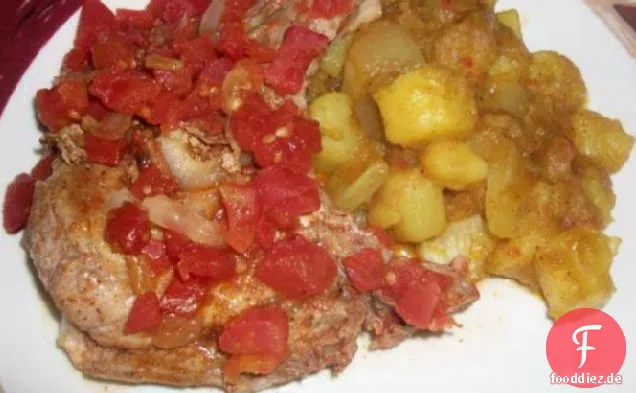 Cajun erstickte Schweinekoteletts