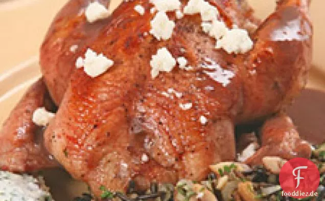 Granatapfel-glasierte Cornish Game Hens mit Wildreis-chestnut St