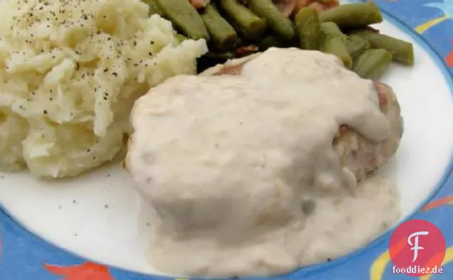 Schweinekoteletts in Pilzsoße erstickt