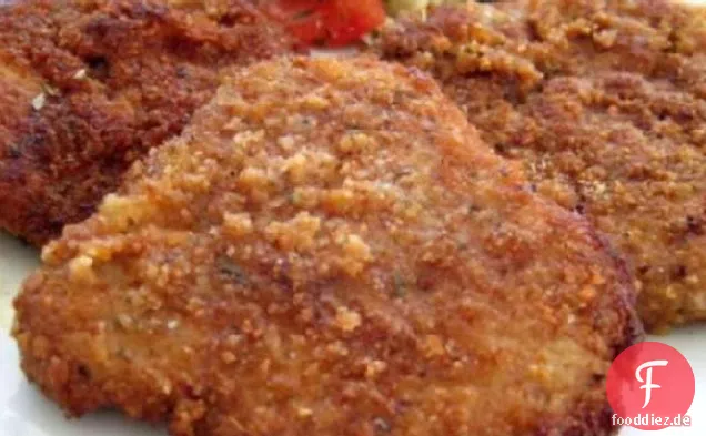 Panierte Parmesan-Schweinekoteletts