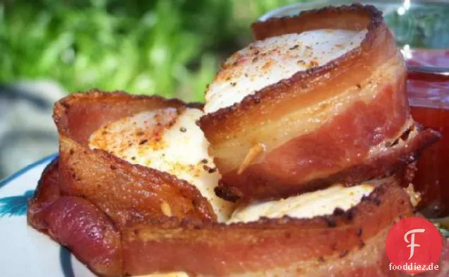 Mit Speck umwickelte Jakobsmuscheln