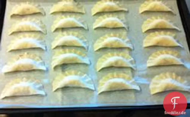 Mit Speck gefüllte Ravioli