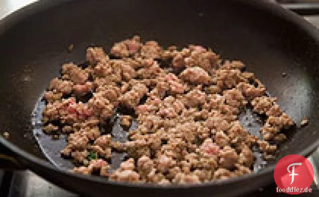 Grünkohl mit Wurst und weißen Bohnen