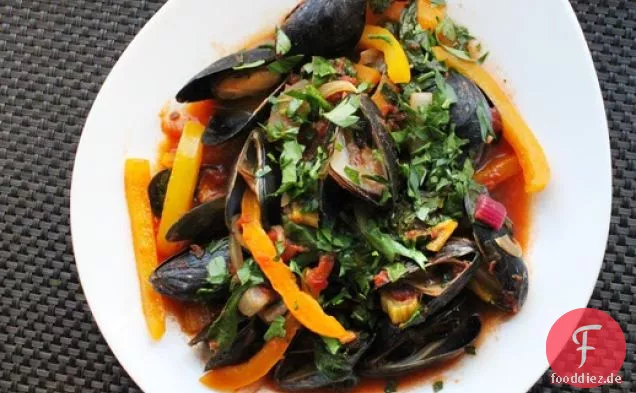 Muscheln mit Mangold und Tomaten