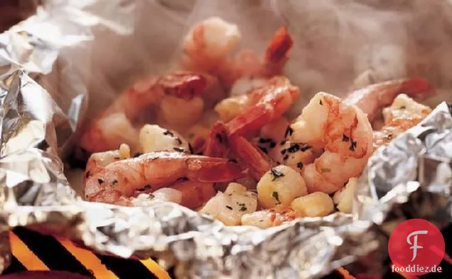 Gegrillte Kräuter Meeresfrüchte-Packs