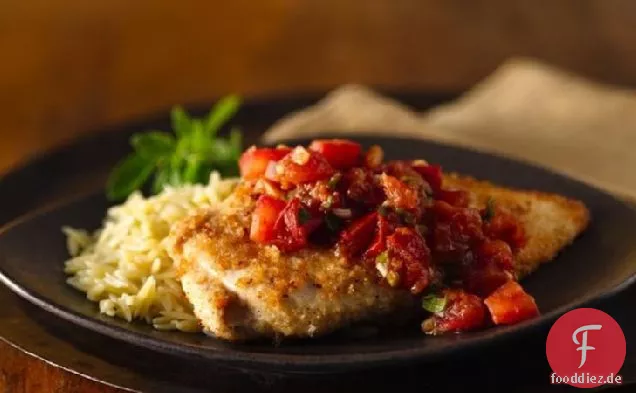 Paniertes Huhn mit Tomaten