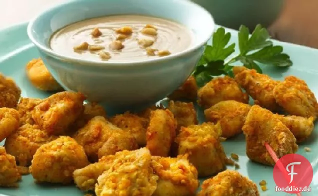 Ofengebratene Hähnchenstücke mit Erdnusssauce