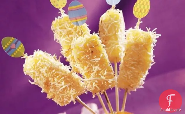 Gefrorene Ananas auf einem Stock