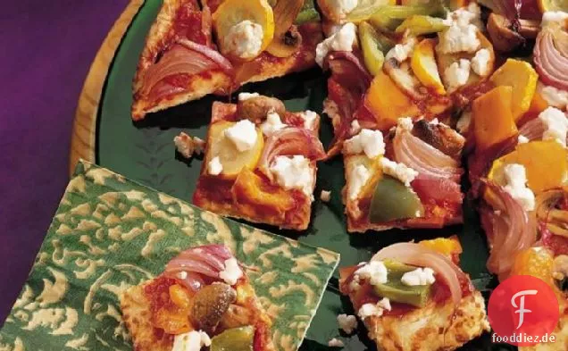 Gebratenes Gemüse und Ziegenkäse-Pizza