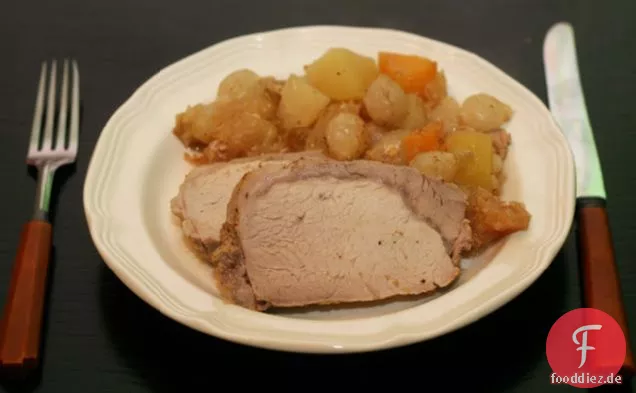 Senf rieb Schweinefleisch mit geschmolzenen Äpfeln und Gemüse