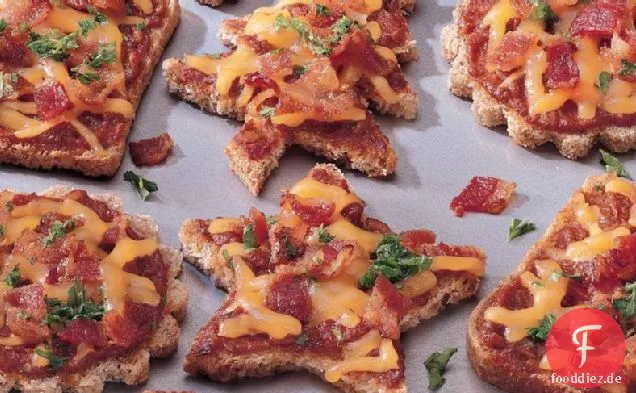 Käse und sonnengetrocknete Tomaten-Canapés