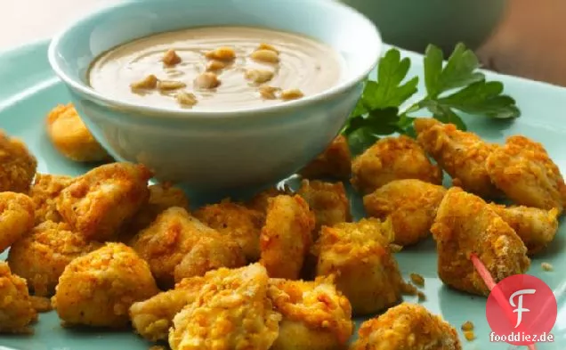 Ofengebratene Hähnchenstücke mit Erdnusssauce