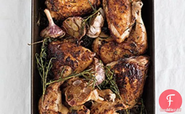 Brathähnchen mit Kräuter-Knoblauch-Pfanne tropft