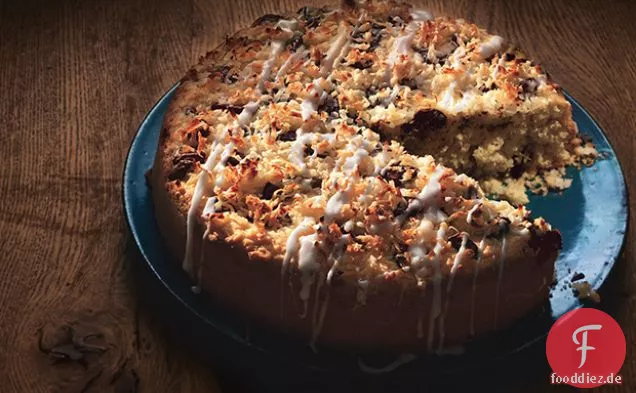 Kokosnusskuchen mit Schokoladenstückchen und Kokosnuss-Nieselregen