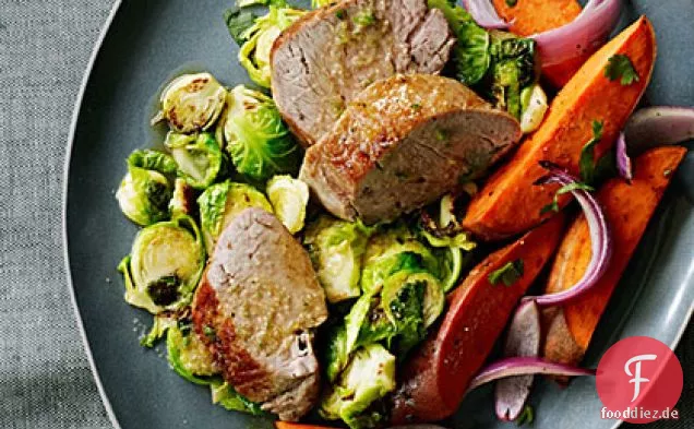 Schweinefleisch und verkohlter Rosenkohl mit Chili-Limettensauce