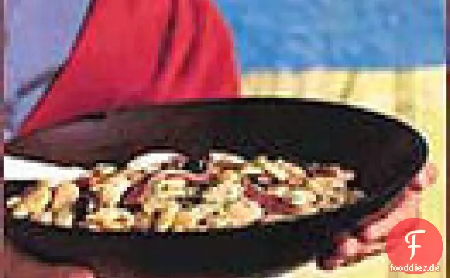 Salat aus weißen Bohnen und rotem Pfeffer mit Pinienkerndressing