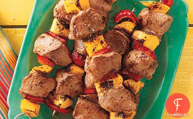 Schweinefleisch und Mango-Spieße