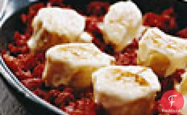 Salz Kabeljau in Tomaten-Knoblauch-Confit