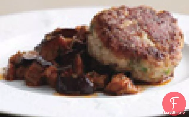 Kalbskuchen auf seidigen Auberginen