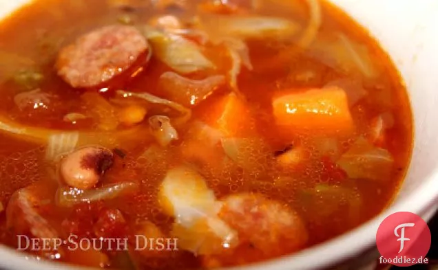 Wurst und Süßkartoffelsuppe