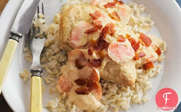 Ersticktes Huhn mit braunem Reis