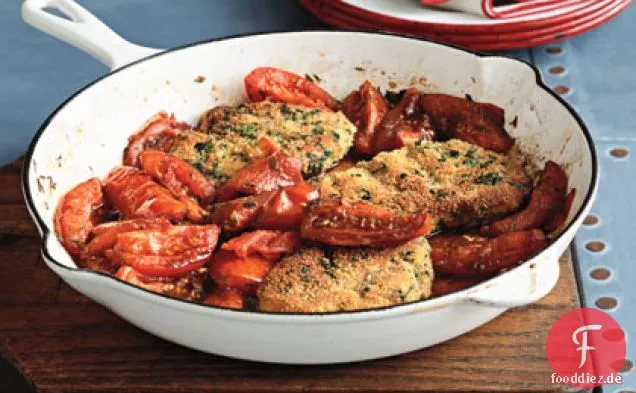 Schweinekoteletts mit gebratenen Tomaten