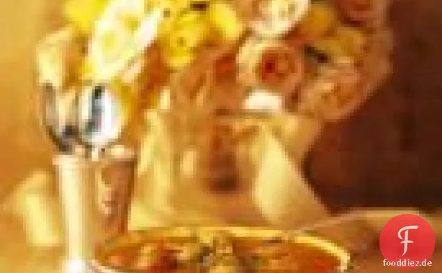 Gebratene Tomatensuppe mit kleinen Fleischbällchen und Reis