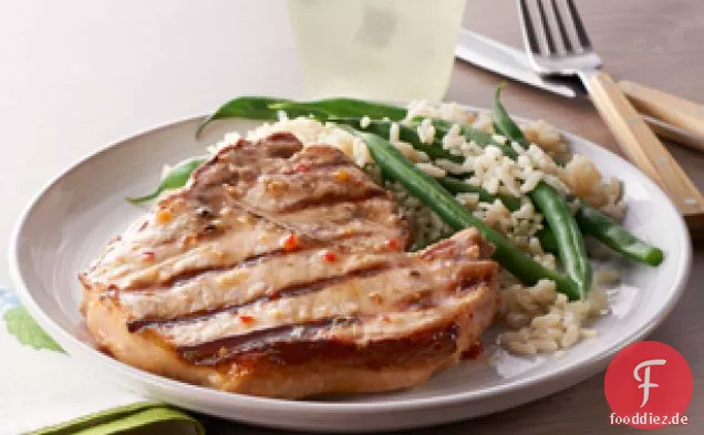 Schweinekoteletts mit grünen Bohnen und Reis