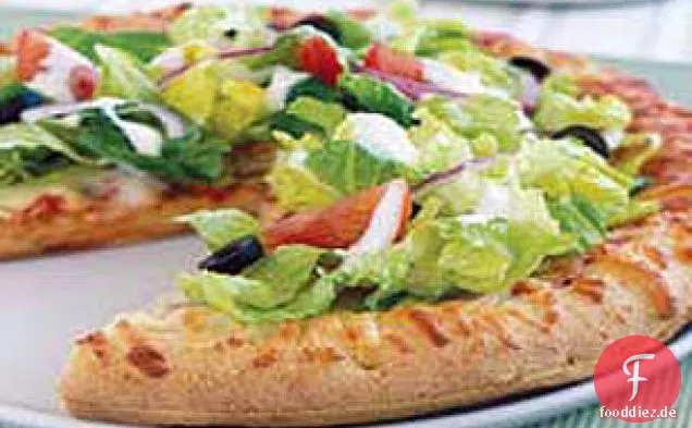 Gartensalat-gekrönte Pizza