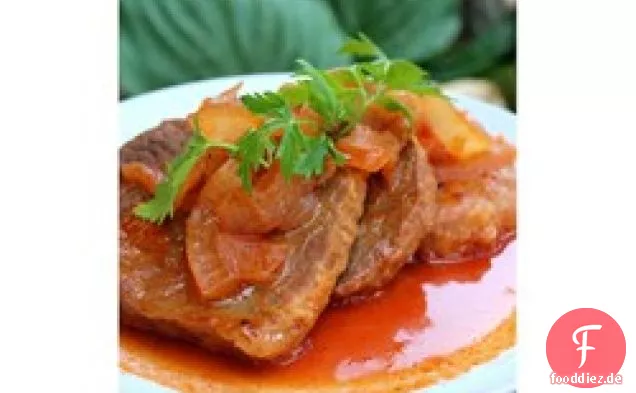Auge von rundem Steak und Ketchup