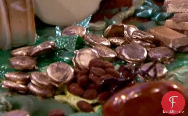 Passionsfrucht-Karamell-Goldmünzen, schokoladenüberzogene Karamell-Mandel-Zauberbohnen und Zimt-Karamell-Macadamia-Schokoriegel