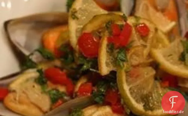 Gegrillte Muscheln mit Currybutter