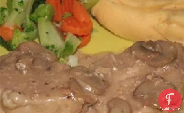 Cremige betrunkene Pilz Schweinekoteletts