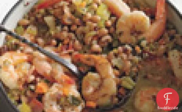 Knoblauchgarnelen mit schwarzem Pfeffer und Erbsen mit schwarzen Augen