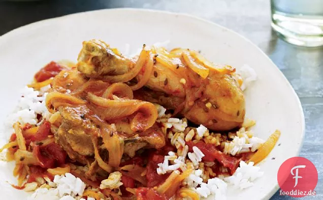 Gewürz-Geschmorte Hähnchenschenkel mit Rotwein und Tomate