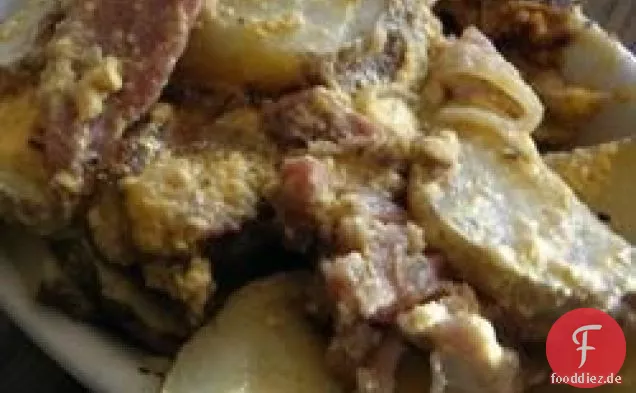 Überbackene Kartoffeln mit Schinken und Speck